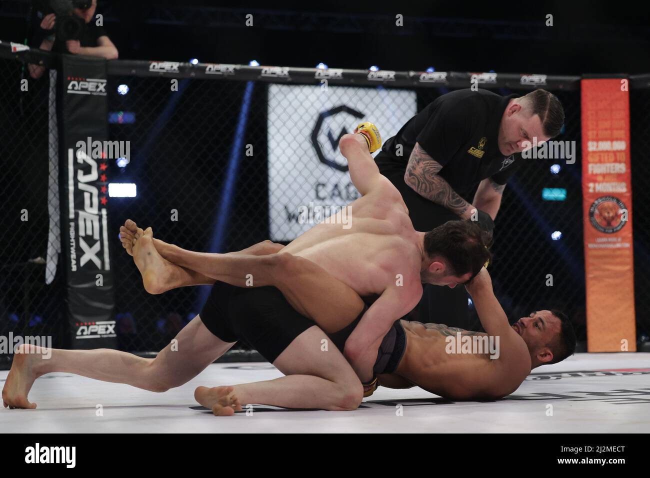 MANCHESTER, UK. APR 2ND Dylan Hazan punches Raymison Bruno during the Cage Warriors 136 event at the BEC Arena, Manchester on Saturday 2nd April 2022. (Credit: Pat Scaasi | MI News) Credit: MI News & Sport /Alamy Live News Stock Photo