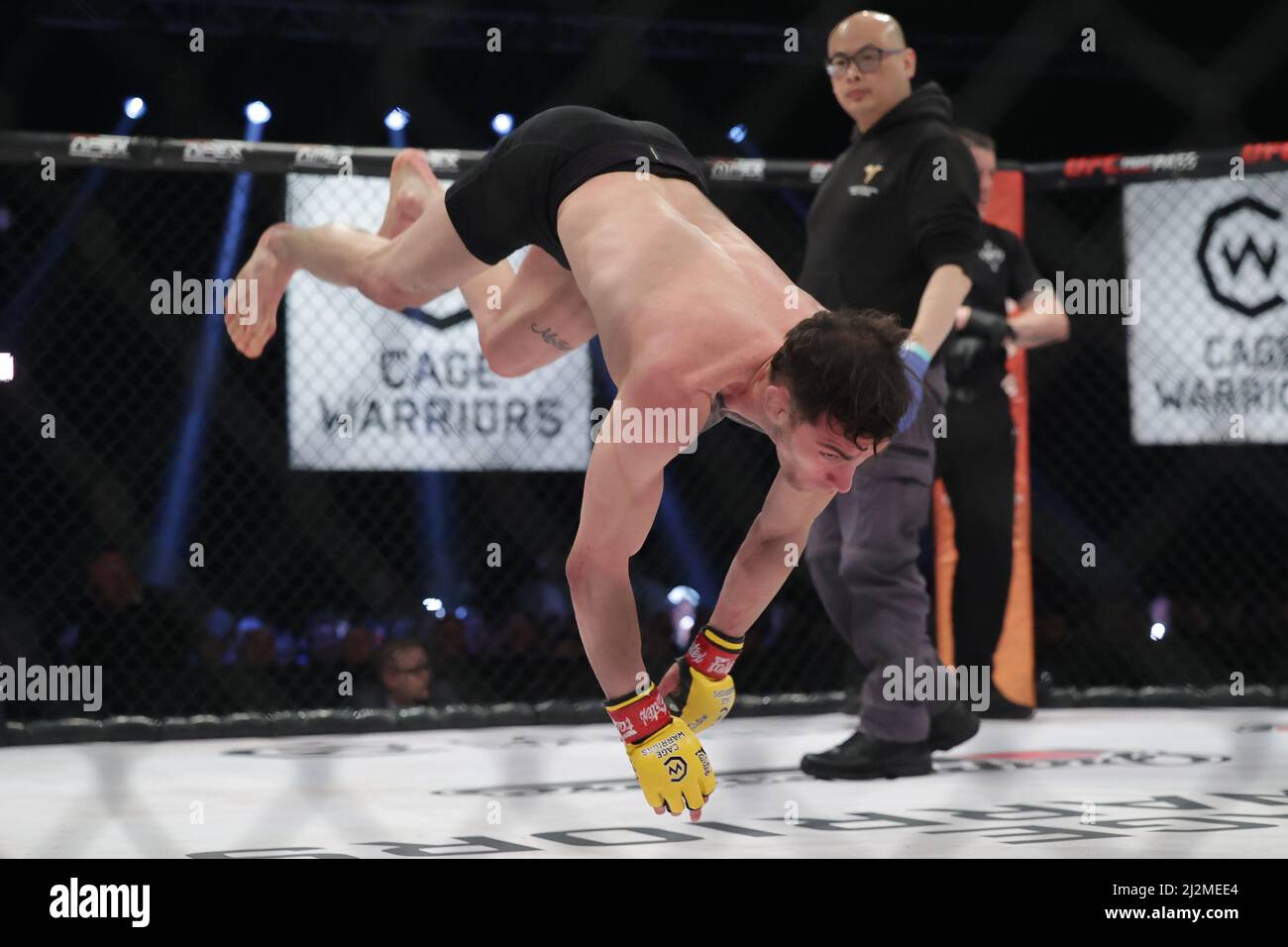 MANCHESTER, UK. APR 2ND Dylan Hazan backflips in celebration after beating Raymison Bruno during the Cage Warriors 136 event at the BEC Arena, Manchester on Saturday 2nd April 2022. (Credit: Pat Scaasi | MI News) Credit: MI News & Sport /Alamy Live News Stock Photo