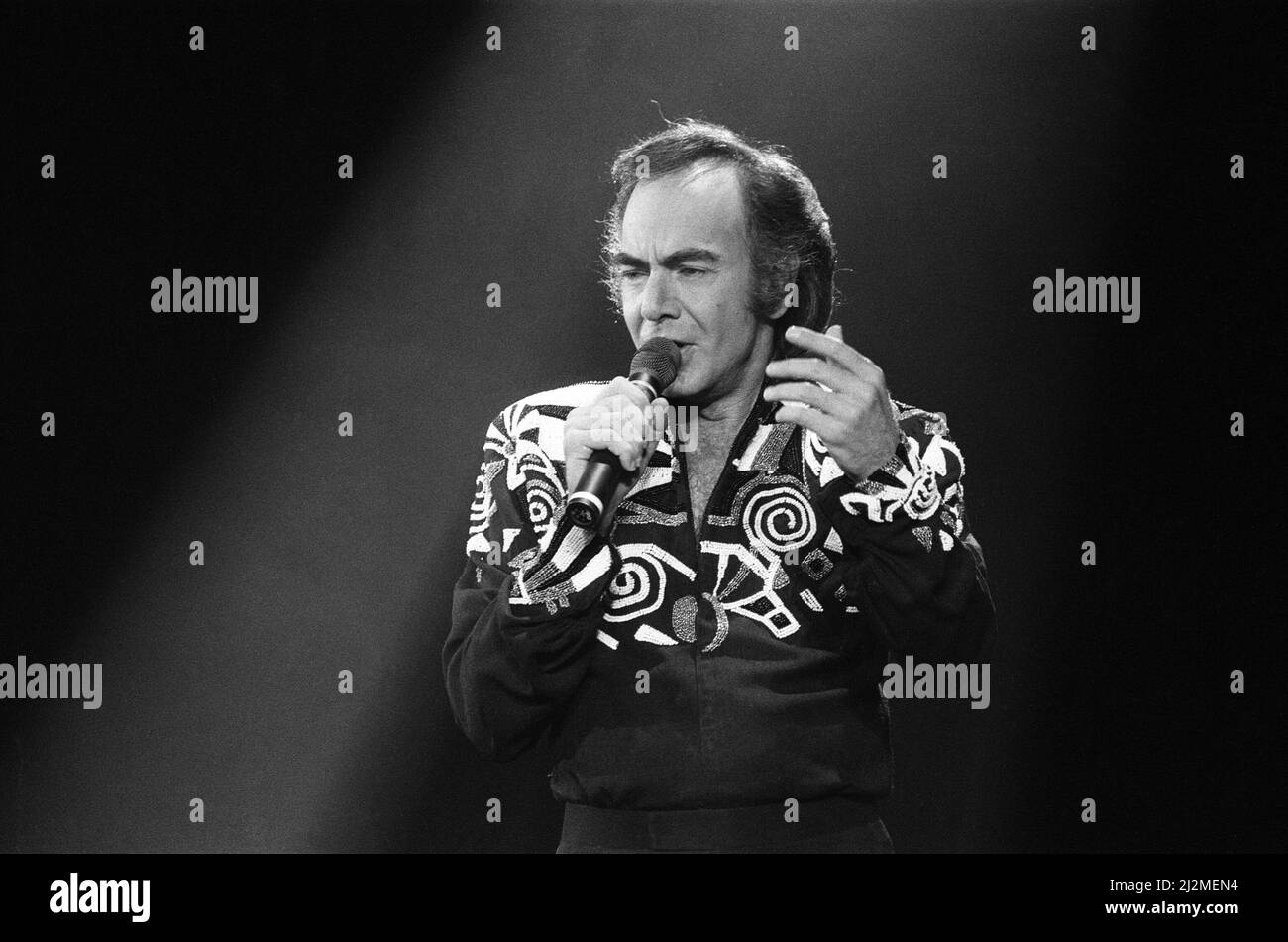 American singer Neil Diamond in concert at the NEC Arena, Birmingham. 8th November 1989. Stock Photo