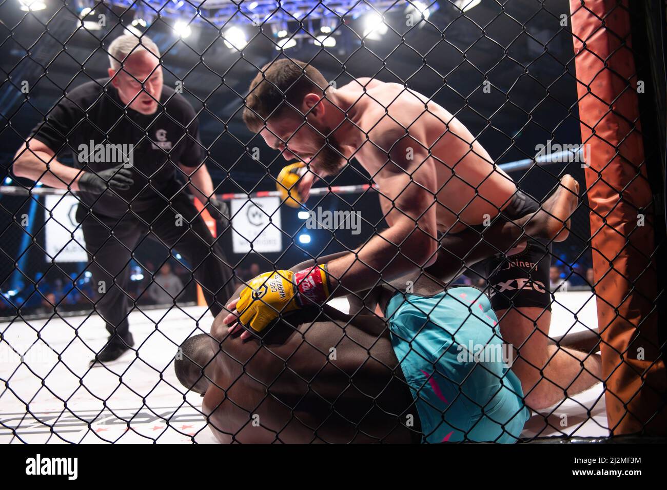 MANCHESTER, UK. APR 2ND Adam Cullen knocks out Ndiaye El Hadji during the Cage Warriors 136 event at the BEC Arena, Manchester on Saturday 2nd April 2022. (Credit: Pat Scaasi | MI News) Credit: MI News & Sport /Alamy Live News Stock Photo