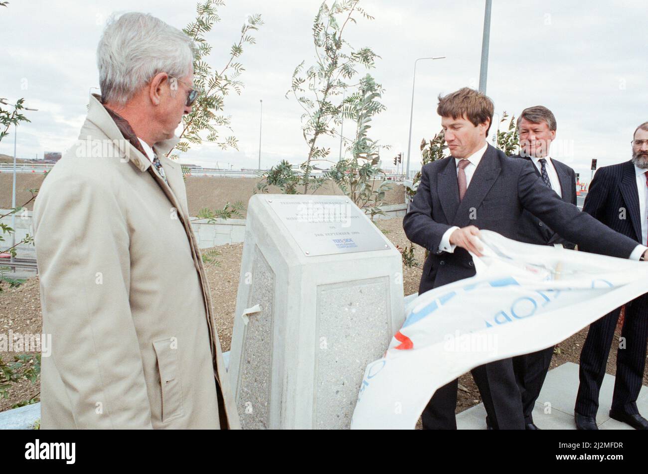 Local Government and Inner Cities Minister Michael Portillo unveils a plaque to mark the opening of the Teesside Park Interchange, with him is Ron Norman, chairman of the TDC. 24th September 1990. The cicil engineering job completed by construction firm Birse, of Middlesbrough, was completed at the Teesside Park retail and leisure complex site. It involved eight miles of piling into peat land at the former racecourse site so an interchange and 500,000 square ft shopping centre could be built. Stock Photo