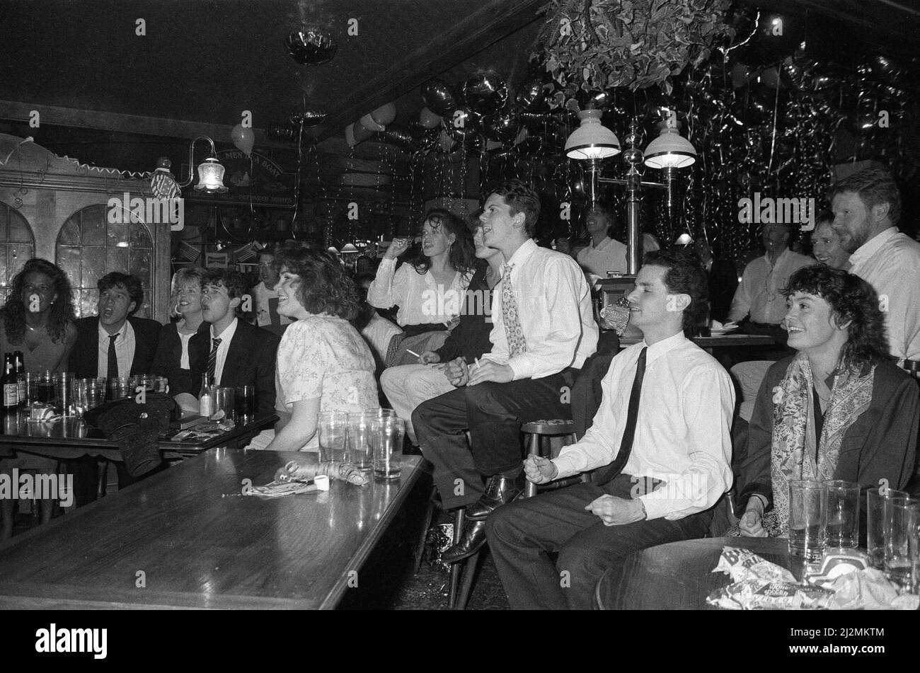 Football fans watching England in their semi-final match during the ...