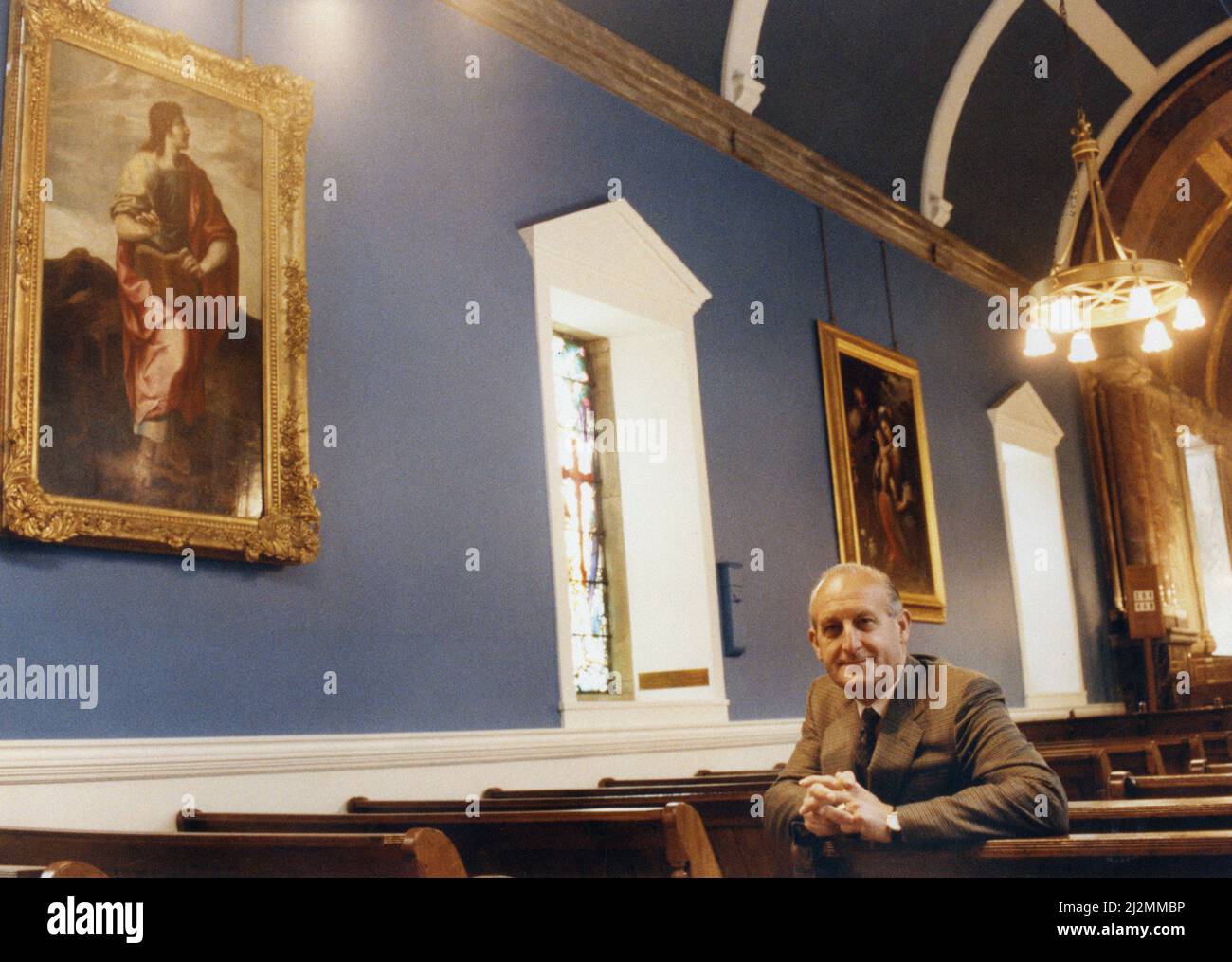 Sir John Hall, property developer (knighted 1991) and life president and former chairman of Newcastle United football club (1992 to 1997), pictured at Wynyard Hall Estate, County Durham, 10th June 1991. Our Picture Shows ... John Hall with paintings back in the chapel. He hopes he can persuade Lord Londonderry to return to his former home. Mr Hall has invested 3million pounds in returning the stately home to its former glory. Stock Photo