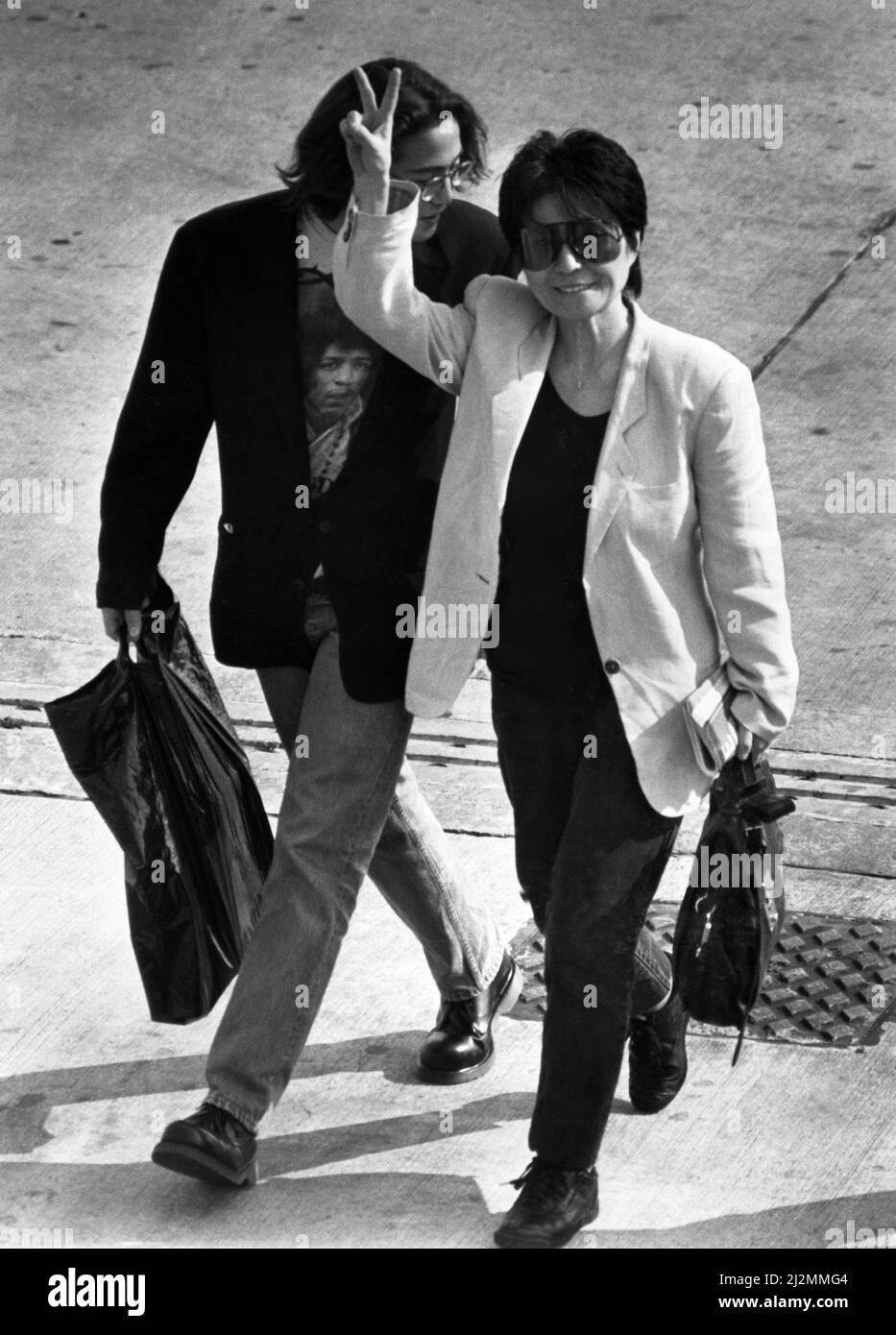 Yoko Ono and Sean Lennon, widow and son of murdered ex-Beatles singer John Lennon, pictured on arrival at Speke Airport in Liverpool.3rd May 1990. Stock Photo