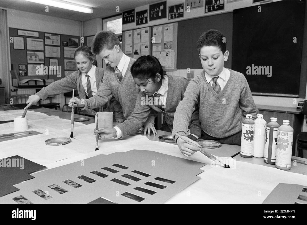 Brushing up on their artwork ¿ fifth year pupils from Battyeford Middle School are helping to produce the scenery for a Rock Nativity. They are (from left): Emily Freeman, Gary Hirst, Tanzima Rahman and Jason Rowlands. The show will be presented by Christ the King Church, Battyeford. 1st February 1991. Stock Photo