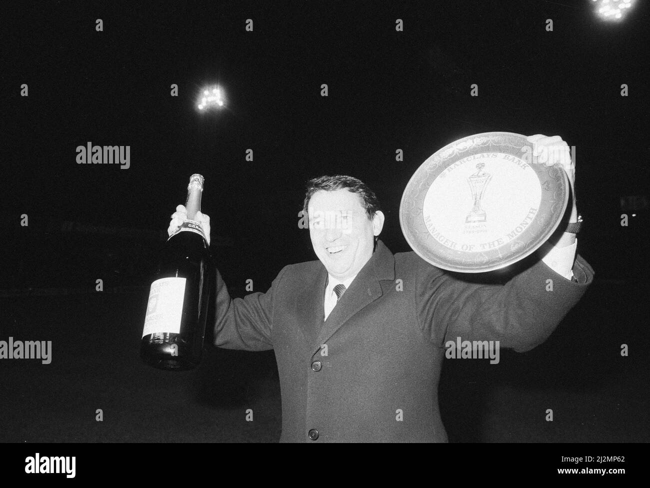 Graham Taylor, Aston Villa manager is presented with a jeroboam of champagne and award for his second consecutive Barclays Bank Manager of the Month award, Villa Park,Wednesday 10th January 1990. Stock Photo