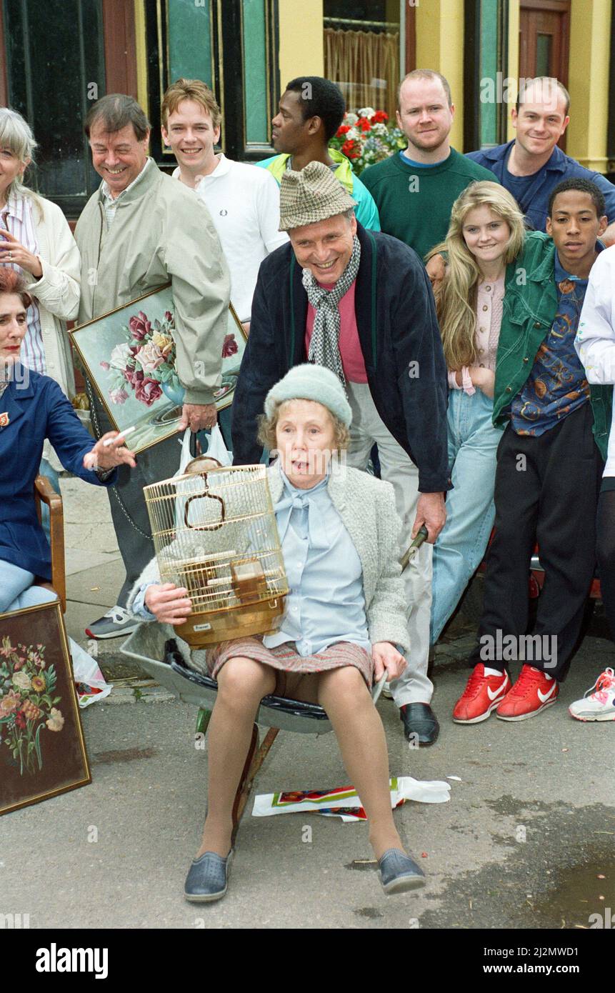 The cast of EastEnders on set. Picture includes Peter Dean, Steve McFadden, Ross Kemp, Daniella Westbrook, June Brown, Bill Treacher, Adam Woodyatt, Gretchen Franklin.  28th June 1991. Stock Photo