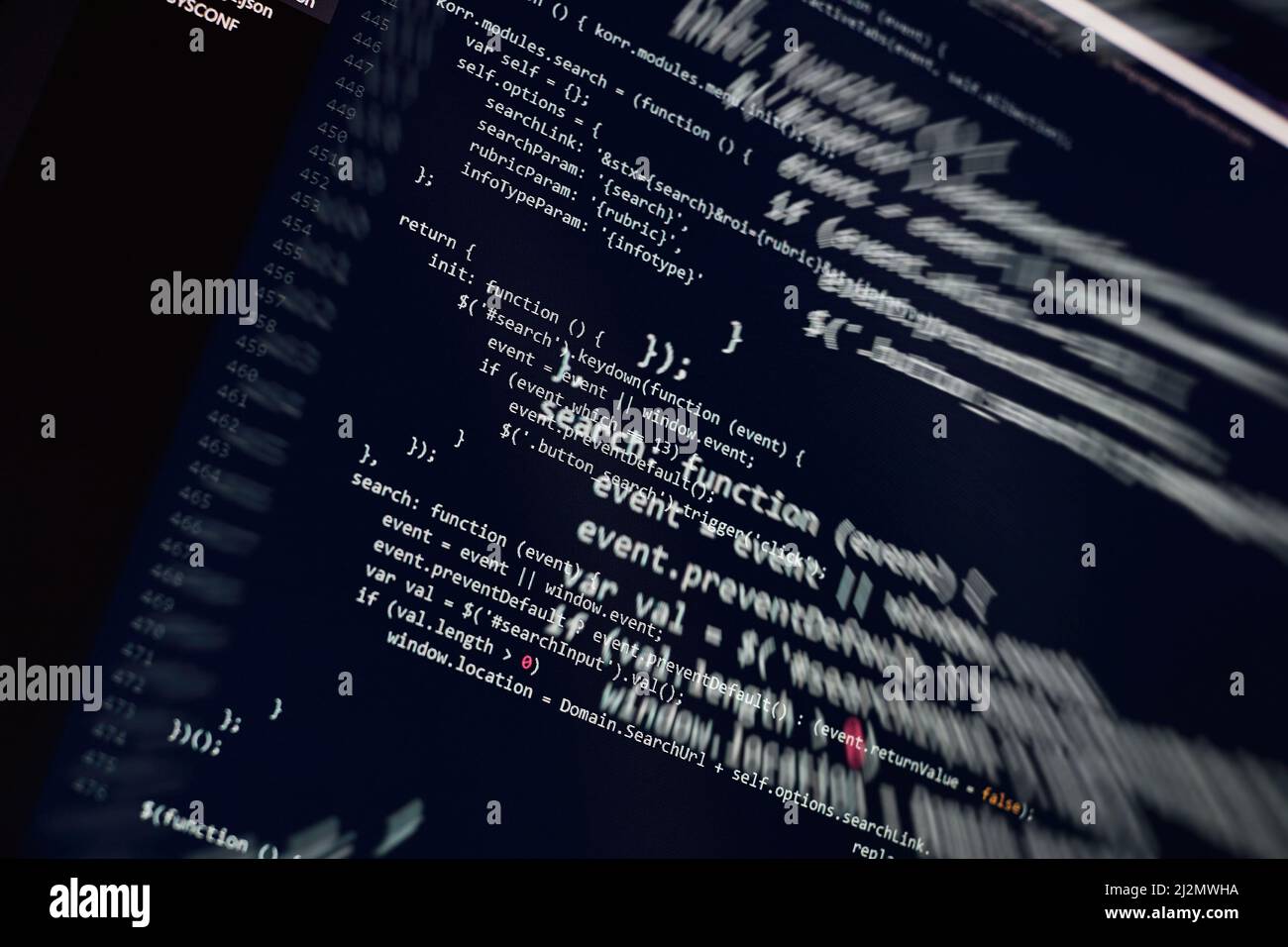 Software developer programming code. Abstract computer script code ...