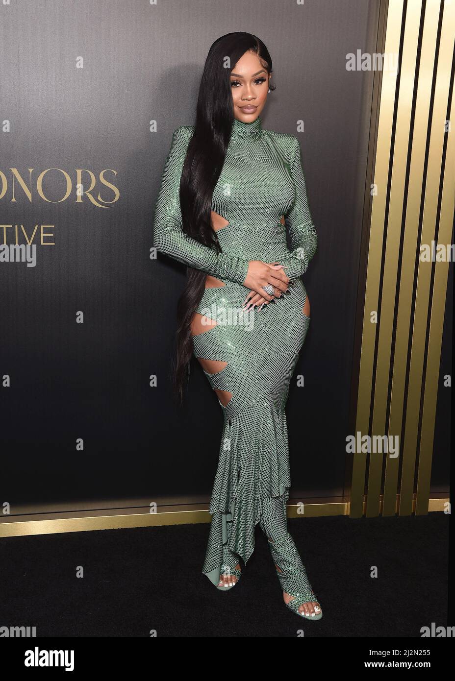 Saweetie walking on the red carpet at the Recording Academy Honors  Presented By The Black Music Collective theld at Resorts World Las Vegas in  Las Vegas, NV on April 2, 2022. (Photo
