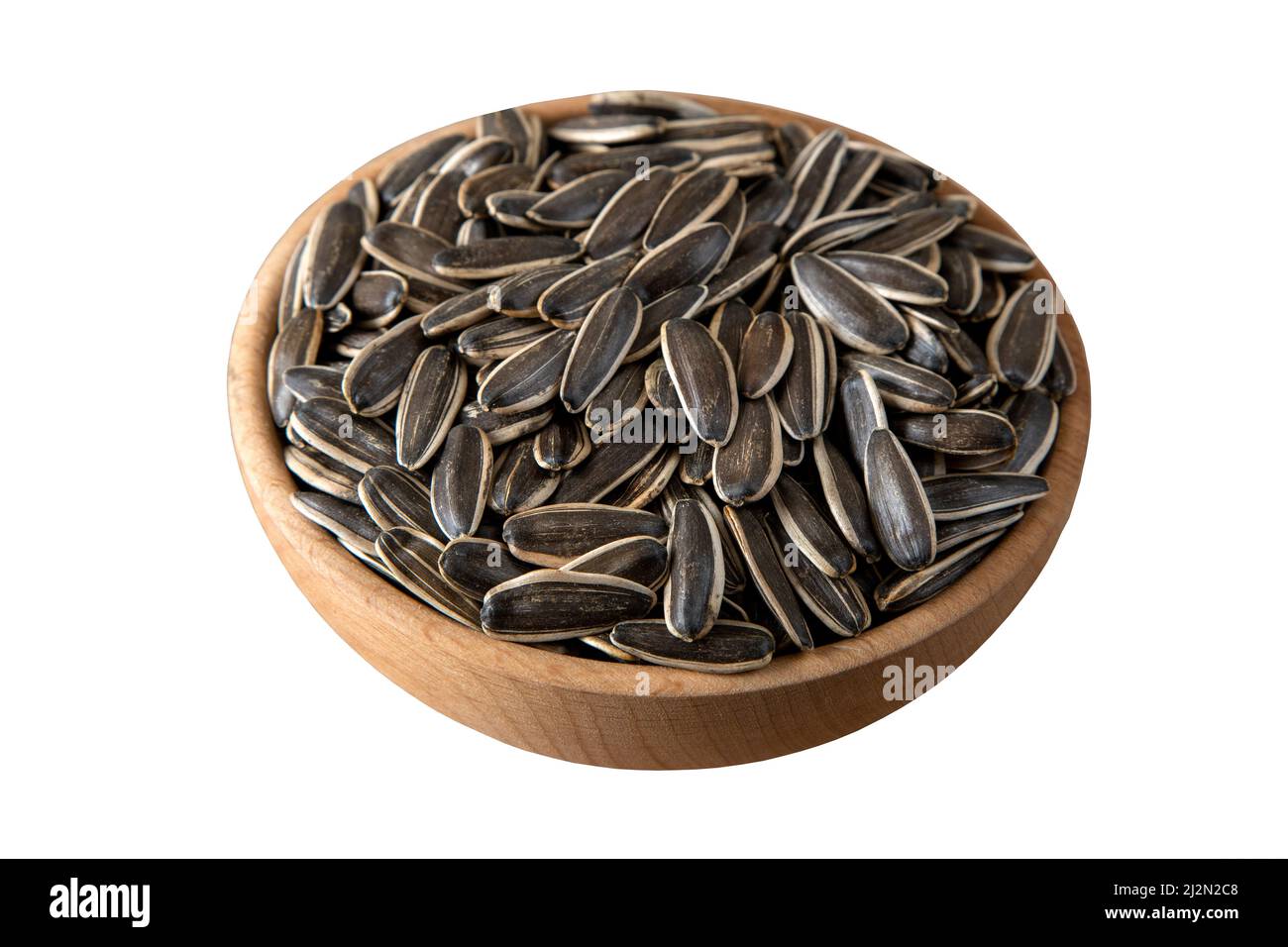 Sunflower seeds in a bowl on white background,top view Stock Photo