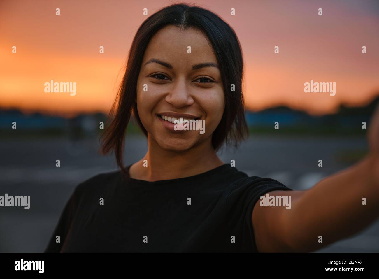 Woman taking photo sunrise hi-res stock photography and images - Alamy