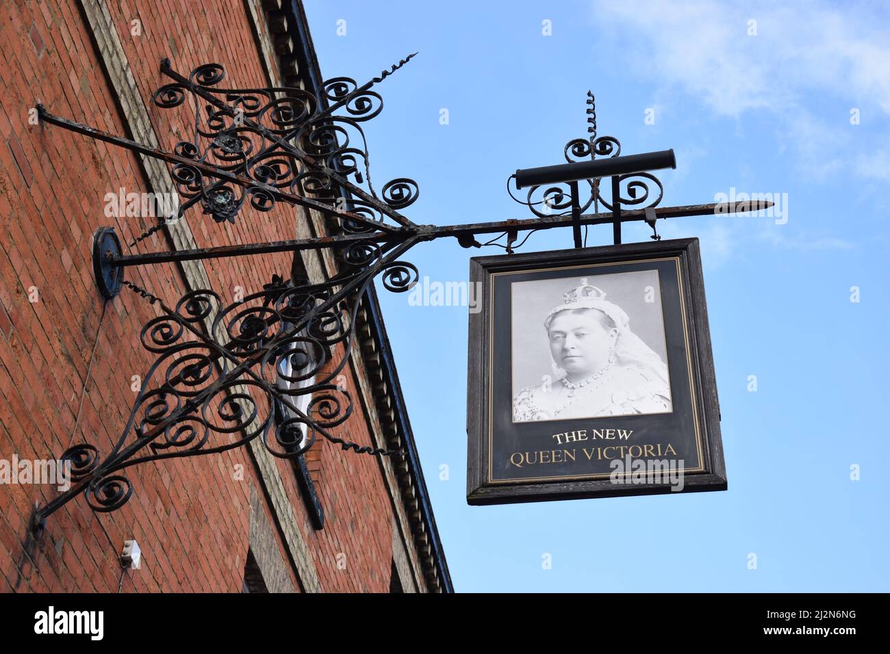 Ornate sign at The New Queen Victoria public house in Wolverton. Stock Photo
