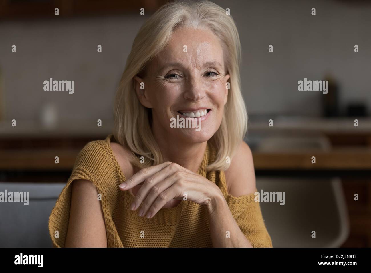 Happy cheerful skinny mature 60s woman home head shot portrait Stock Photo  - Alamy
