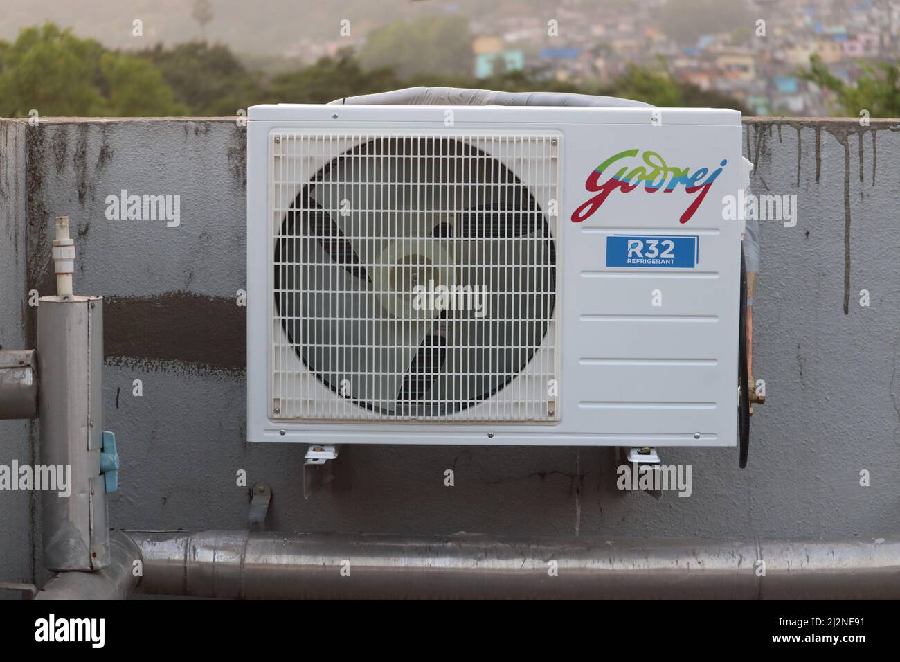 Mumbai, Maharashtra, India, March 16 2022: Air conditions are in demand as the summer heat begin to increase. Godrej inverter Air conditioner out door Stock Photo