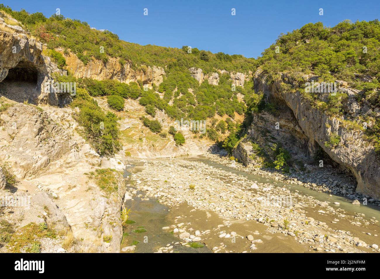 Holiday goers relax and go swimming in the thermal baths in Benje. Stock Photo