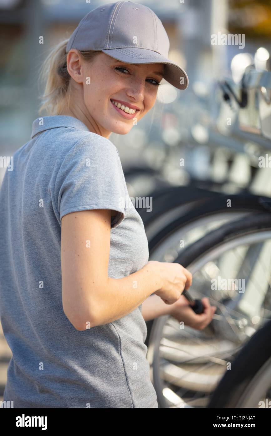 Pumping Up Woman pumping up air pump hi-res stock photography and images - Alamy