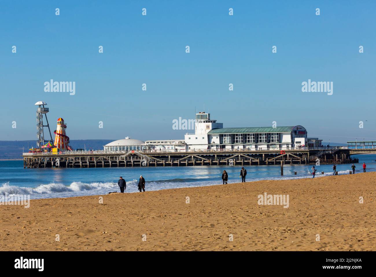 Bournemouth, Dorset UK. 3rd April 2022. UK weather: sunny with blue skies at Bournemouth beach after a cold frosty start to the day, as visitors head to the seaside to enjoy the sunshine. Credit: Carolyn Jenkins/Alamy Live News Stock Photo