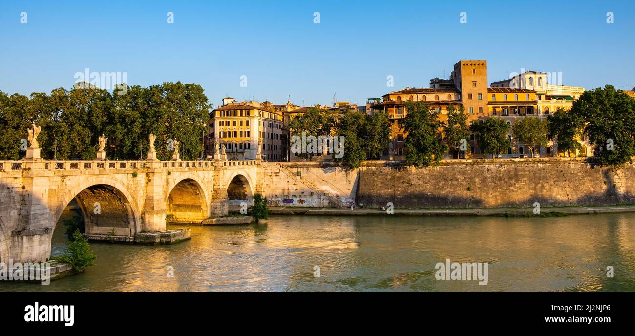 Rome, Italy - May 27, 2018: Panoramic view of Tiber river and Lungotevere Tor di Nona embankment aside Ponte Sant'Angelo Saint Angel Bridge Stock Photo