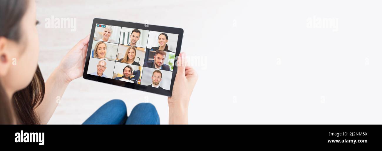Video conference with multiple employees. Tablet application for remote work and study from home. Stock Photo