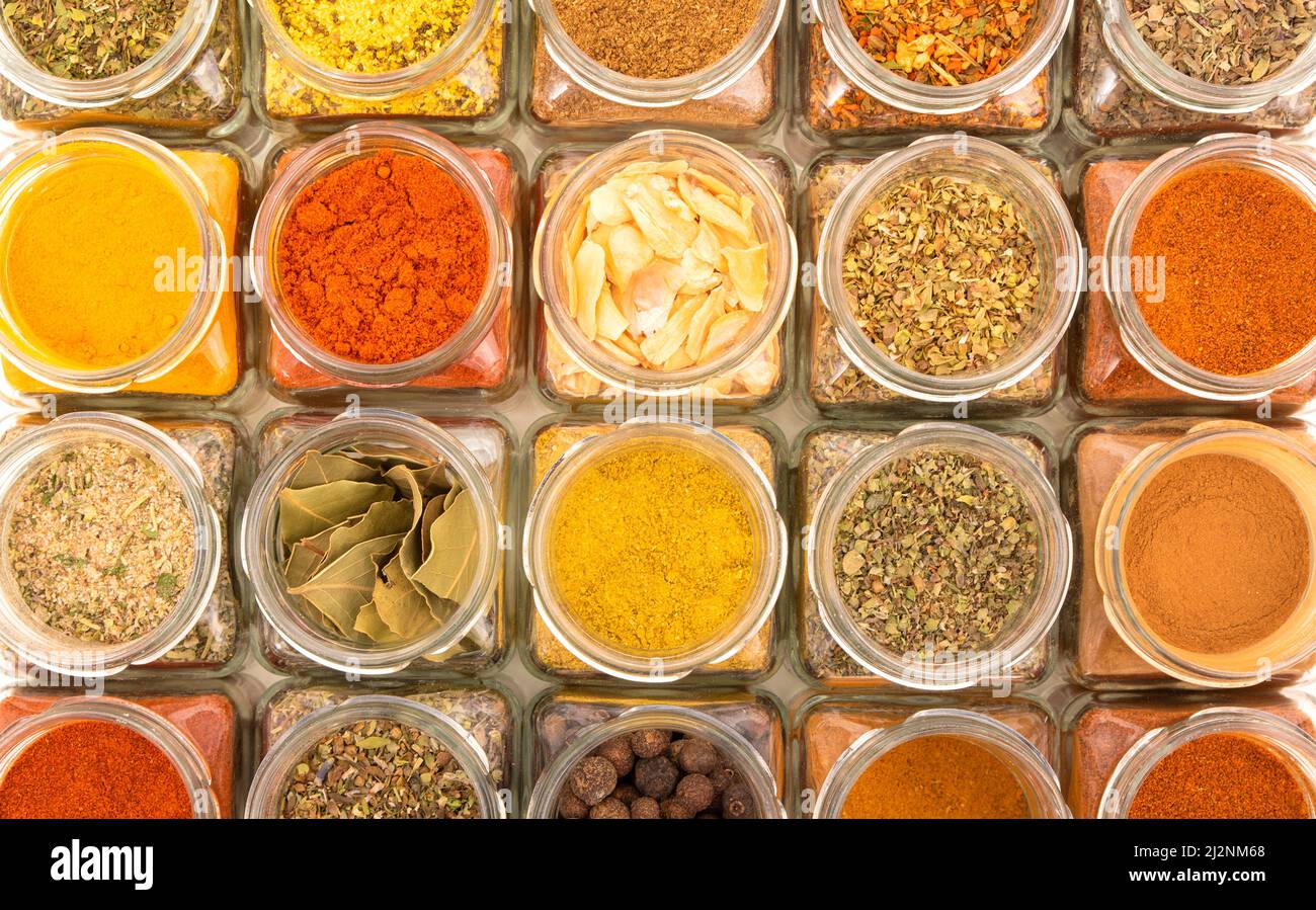 Large collection of spices in small jars Stock Photo by ©CreativeFamily  265762566
