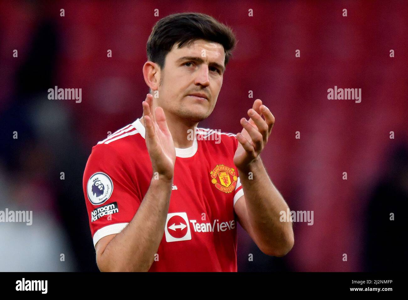 Manchester United's Harry Maguire applauds the fans after the final whistle during the Premier League match at Old Trafford, Greater Manchester, UK. Picture date: Saturday April 2, 2022. Photo credit should read: Anthony Devlin Stock Photo