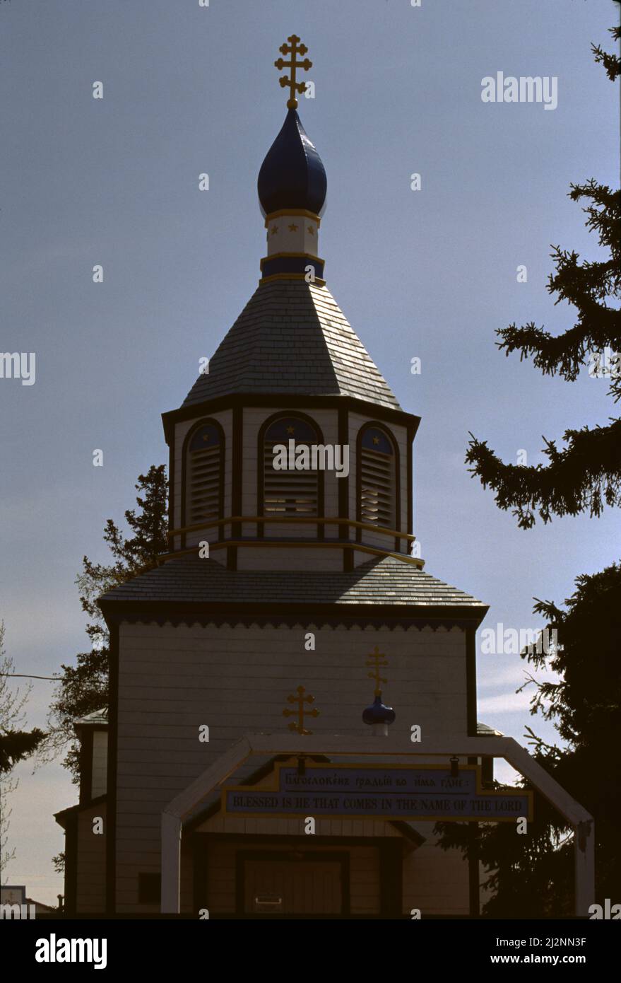 Kenai, AK. U.S.A. 6/1997. Holy Assumption Orthodox Church; also known as Church of the Assumption of the Virgin Mary, is a Russian Orthodox. Completed in 1896, it is the oldest-standing Russian Orthodox church in Alaska; a National Historic Landmark in 1970 and was added to the National Register of Historic Places shortly after. Stock Photo
