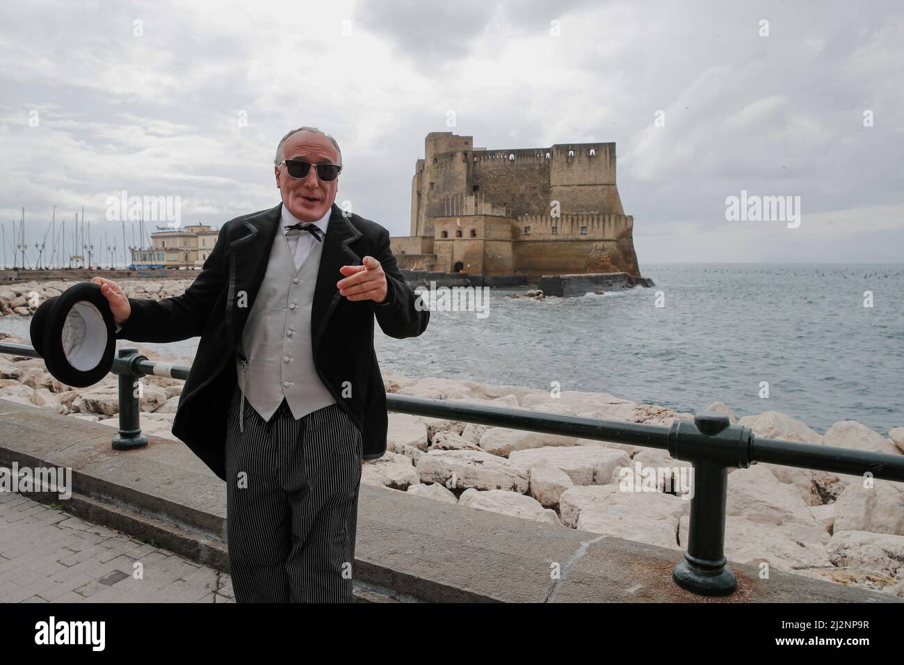 Naples, Italy. 01st Apr, 2022. The actor, imitates Francesco Paolocci in Naples in via Partenope, in the role of Antonio De Curtis, prince of laughter aka Totò. Credit: Independent Photo Agency/Alamy Live News Stock Photo