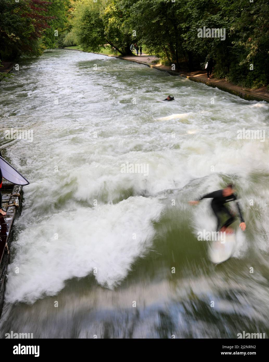 Eisbach Is The River Of The City Of Munich In Germany Where You Can Surf In The Waves Stock