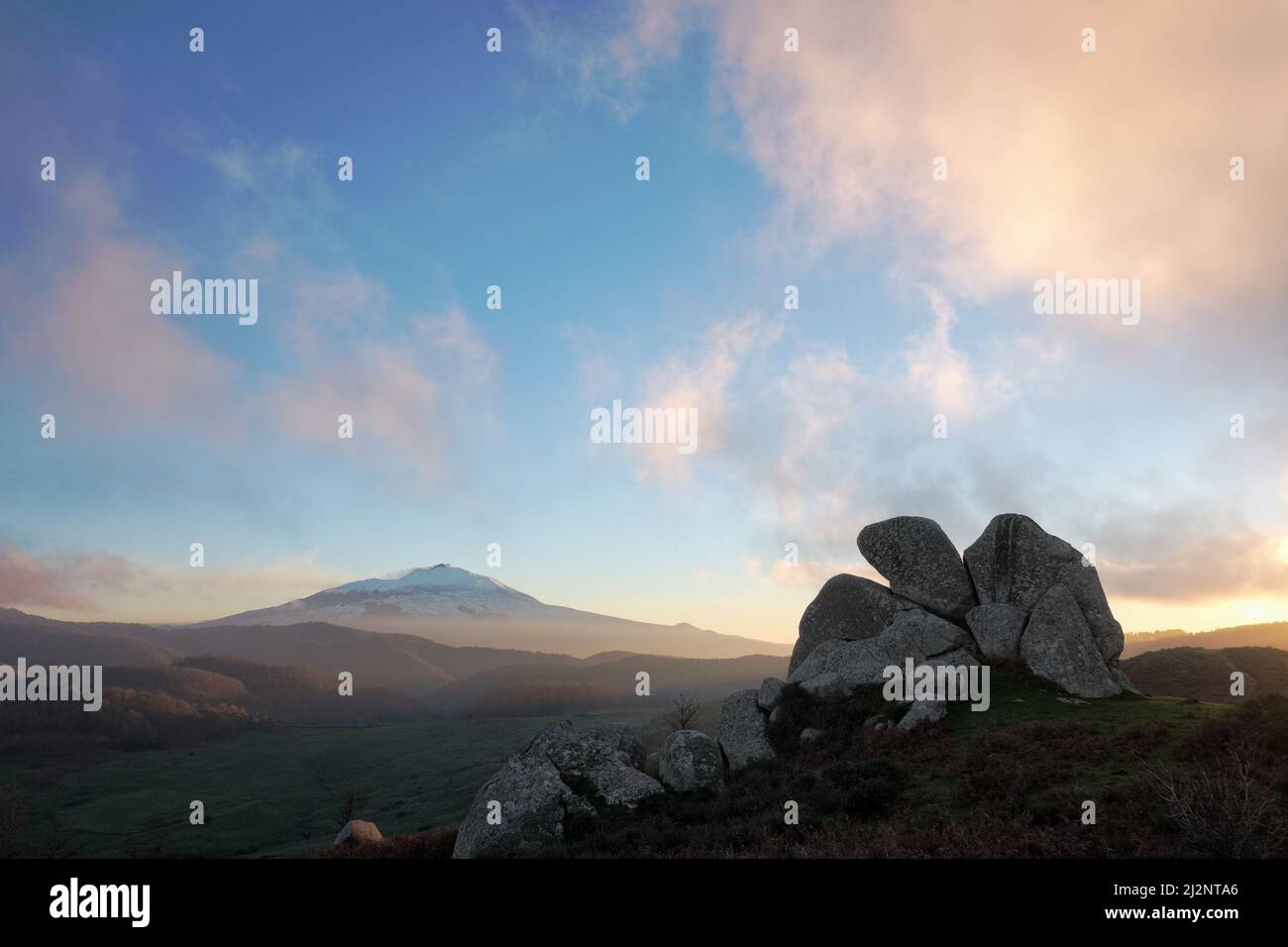 rocky formation shape like an eagle and Etna volcano, Sicily Stock Photo