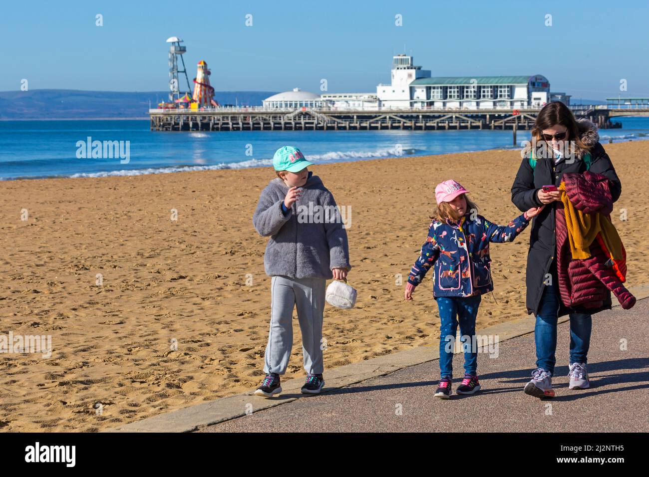 Bournemouth, Dorset UK. 3rd April 2022. UK weather: sunny with blue skies at Bournemouth beach after a cold frosty start to the day, as visitors head to the seaside to enjoy the sunshine. Credit: Carolyn Jenkins/Alamy Live News Stock Photo