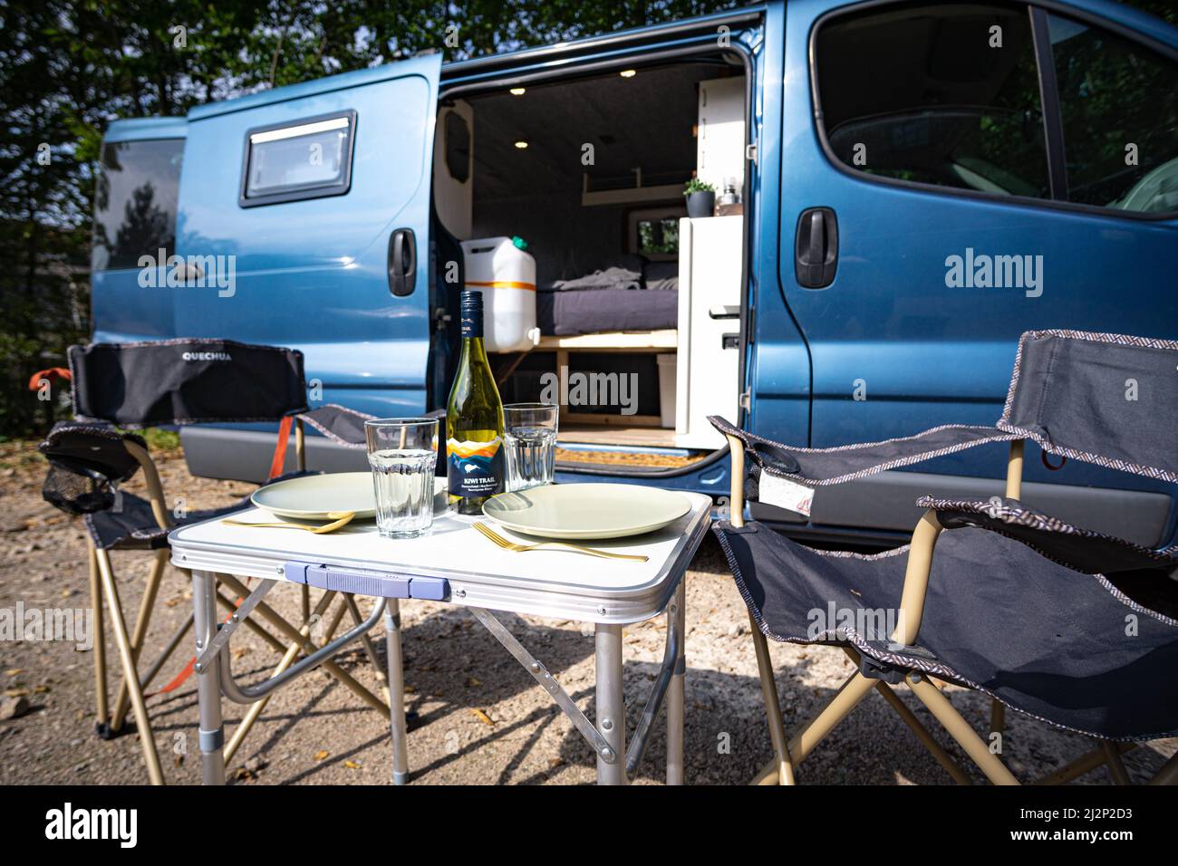 Cosy vacation in a self converted camper van Stock Photo