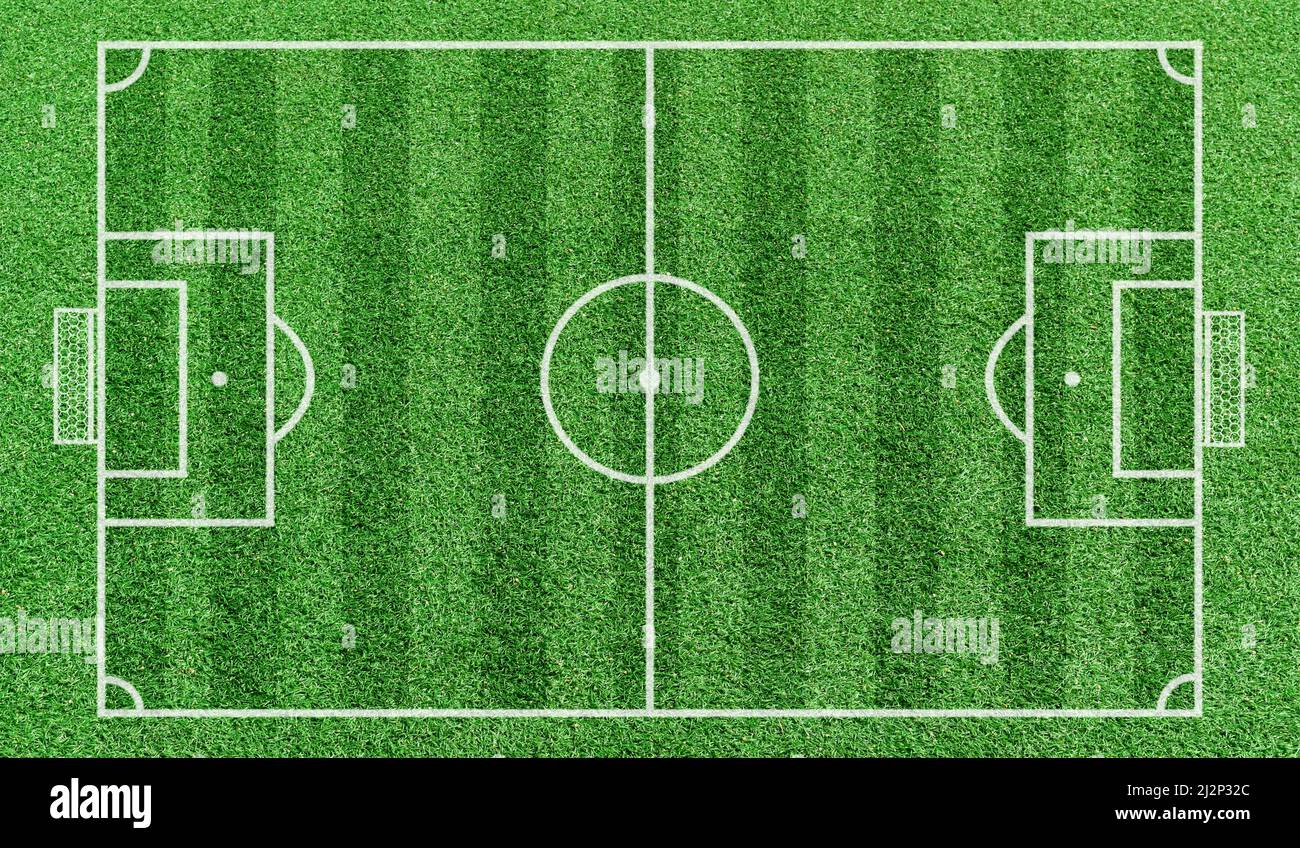 Football stadium. Top view stripe grass soccer field. Green lawn with
