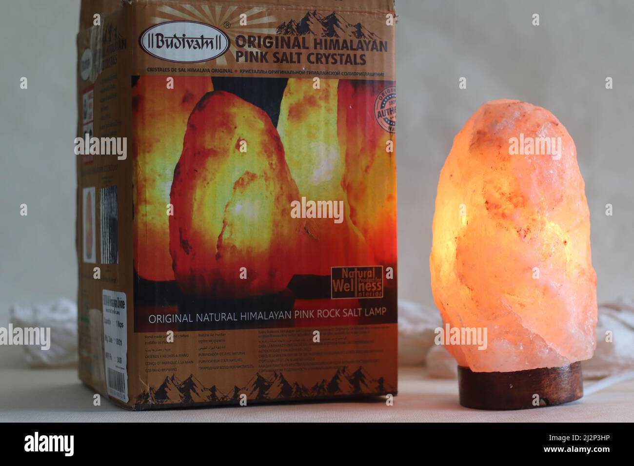 Mumbai, Maharashtra, India, March 16 2022: Budivam original Himalayan pink salt crystal lamp. Lamp handcrafted with rare crystals which are 250 millio Stock Photo