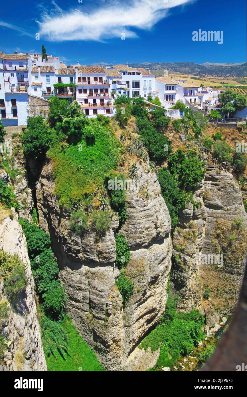 View on ancient village Ronda located precariously close to the edge of