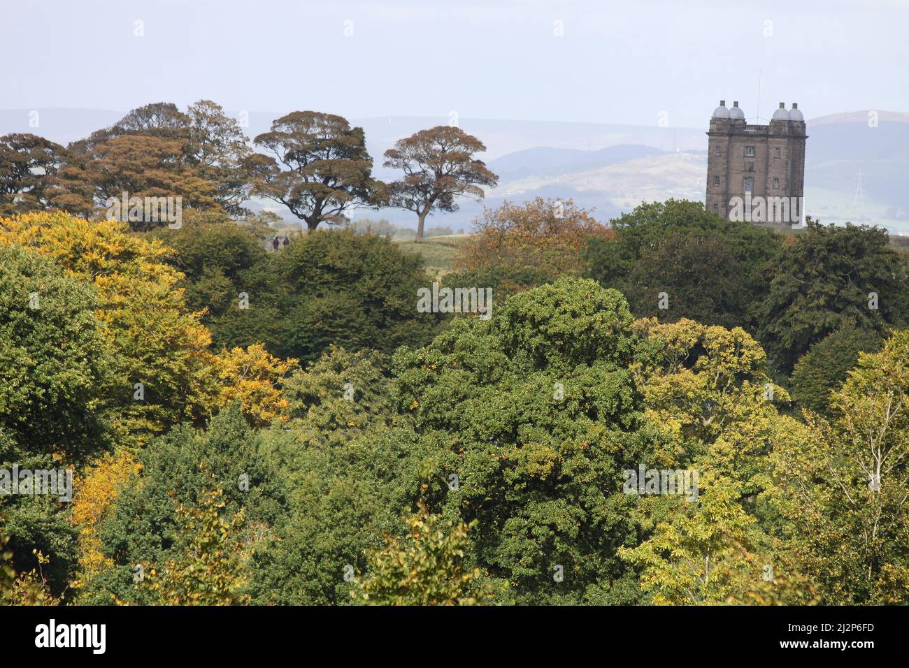Overlooking Woodland Towards The Cage in Lyme Park, Cheshire, UK Originally A Hunting Lodge And Was Later Used As A Lock-up for Prisoners Stock Photo
