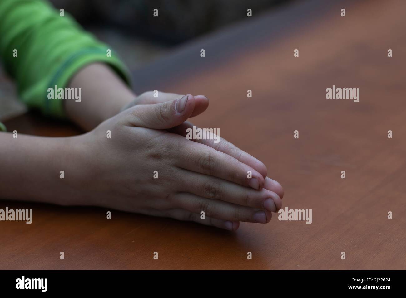 Girl folded hands in prayer hi-res stock photography and images - Alamy