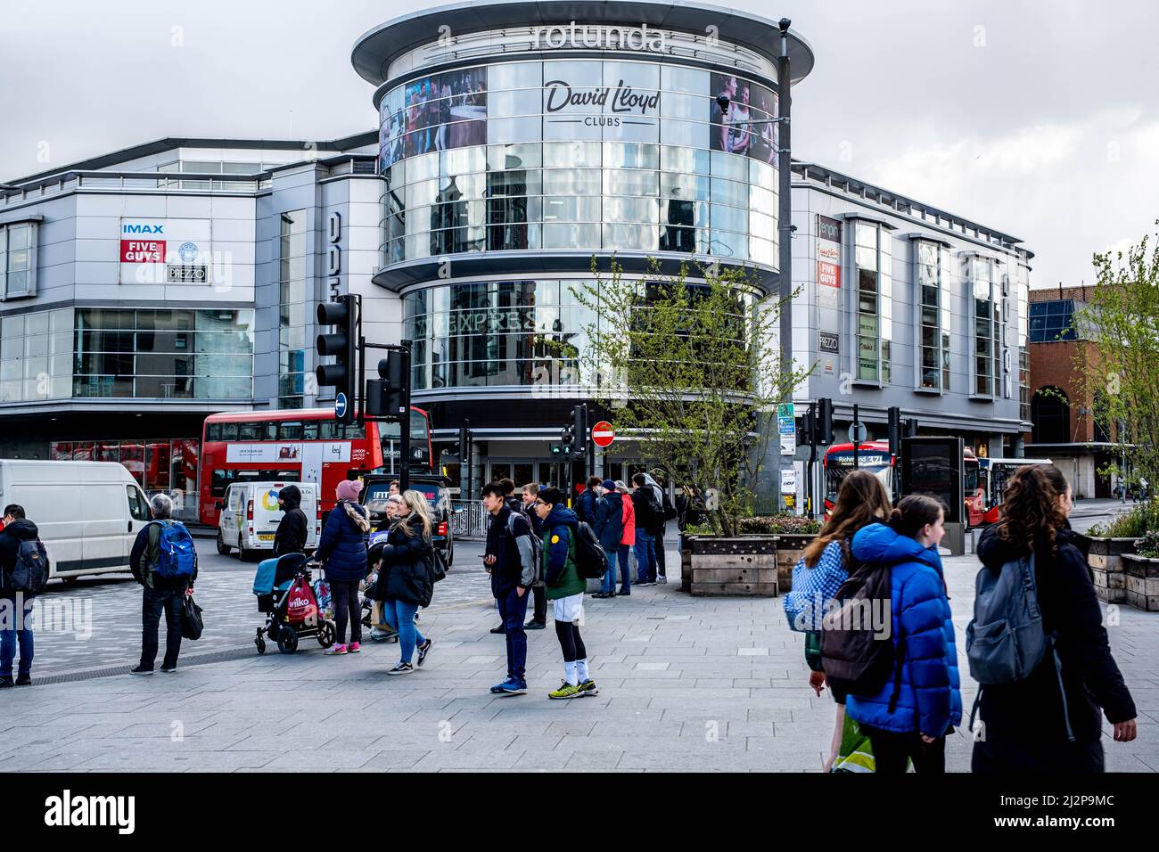 Kingston Upon Thames London UK, April 01 2022, Odeon Cinema Complex Building Exterior With Crowds Passing And Traffic Stock Photo