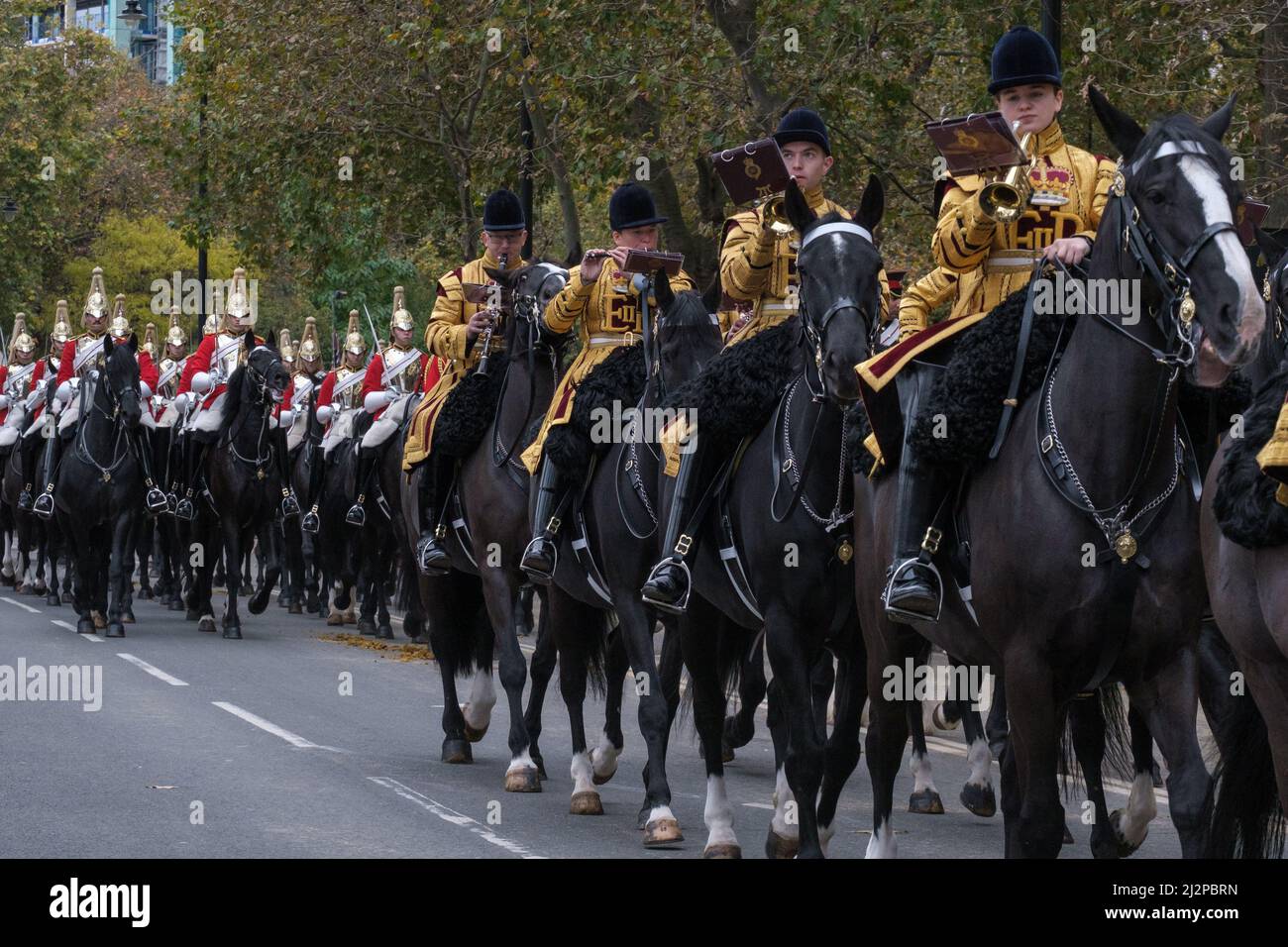 The Band of The Household Cavalry playing wind band instruments while on horseback at the Lord Mayor’s Show 2021 Victoria Embankment, London, UK Stock Photo