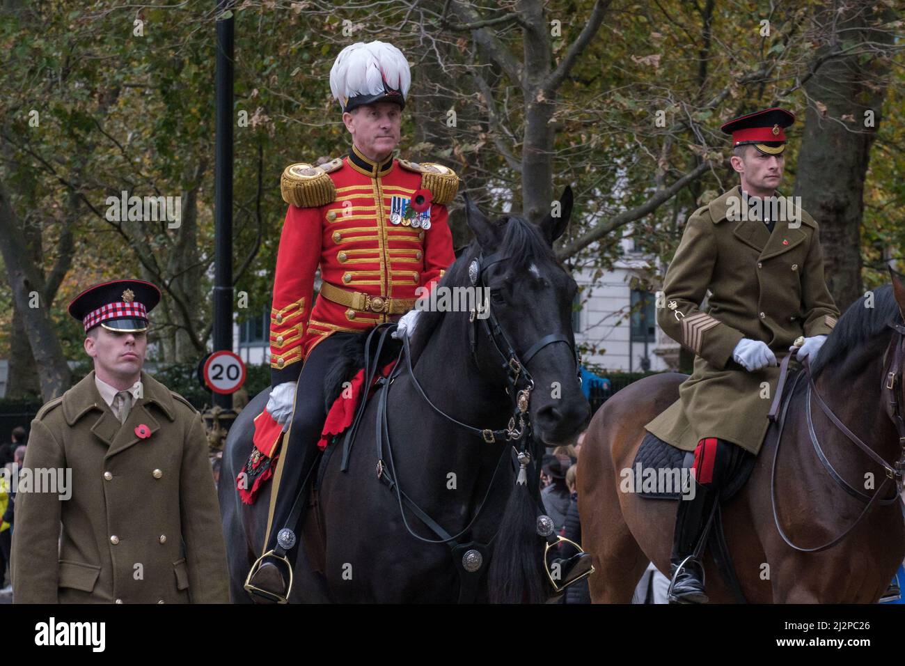 Two men on horseback in military ceremonial uniforms. Scots Guard
