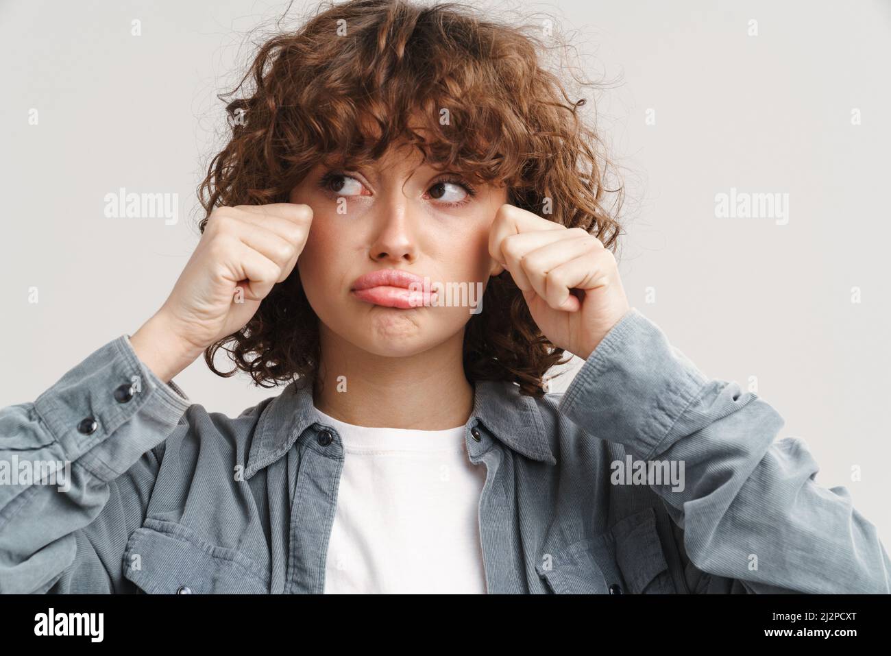 sad woman crying, looking aside on black background, closeup portrait,  profile view Stock Photo - Alamy