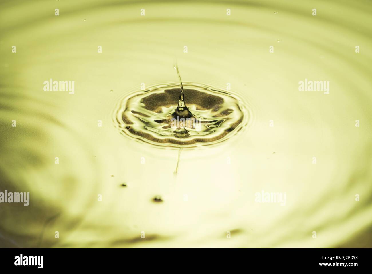 Beautiful macro view of drops making circles on water surface isolated ...