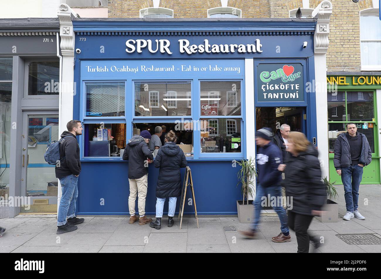 London, England, 3rd April 2022. Fans get takeaway from a local restaurant before the Premier League match at the Tottenham Hotspur Stadium, London. Picture credit should read: Paul Terry / Sportimage Credit: Sportimage/Alamy Live News Stock Photo