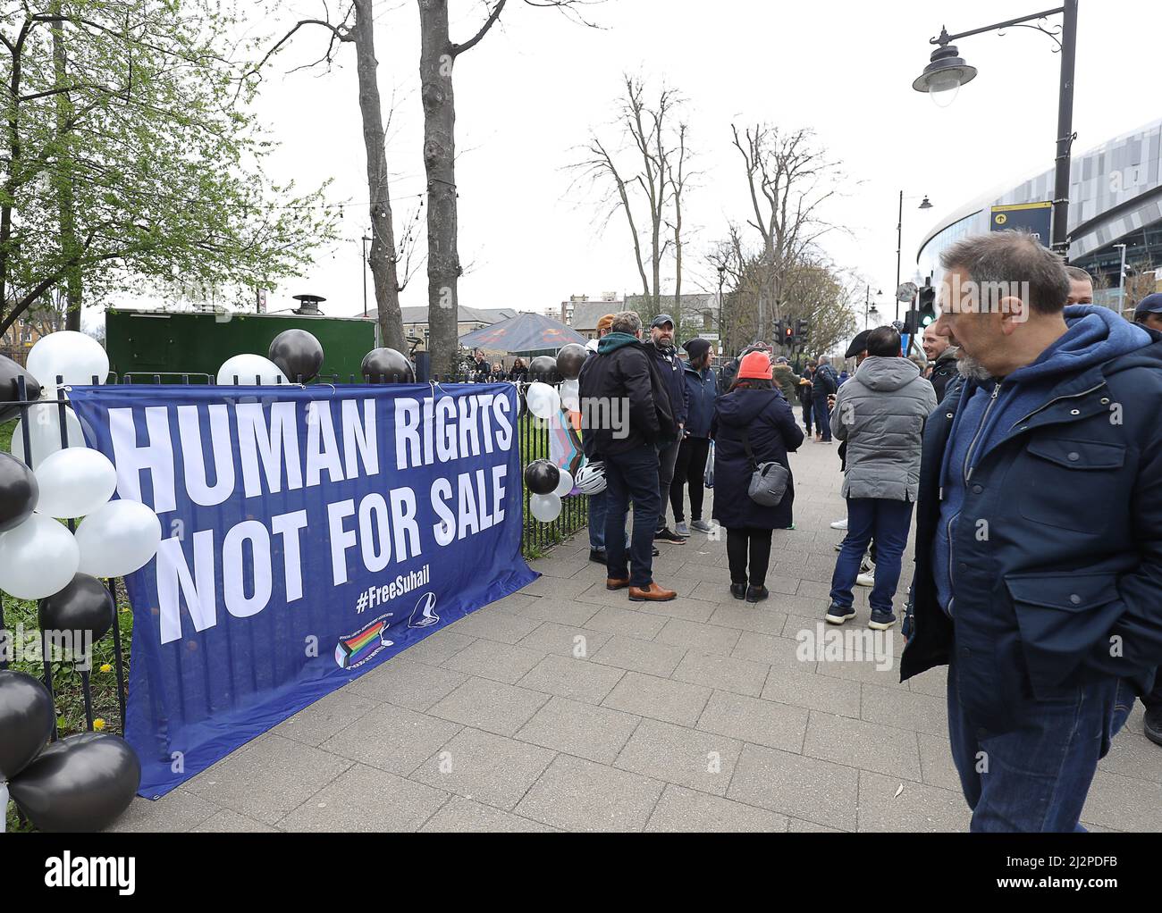 London, England, 3rd April 2022. A group of Tottenham Supporters gather outside the stadium with a banner referring to the Saudi ownership of Newcastle United and the stance the Country has on the LGBTQ+ community before the Premier League match at the Tottenham Hotspur Stadium, London. Picture credit should read: Paul Terry / Sportimage Credit: Sportimage/Alamy Live News Stock Photo