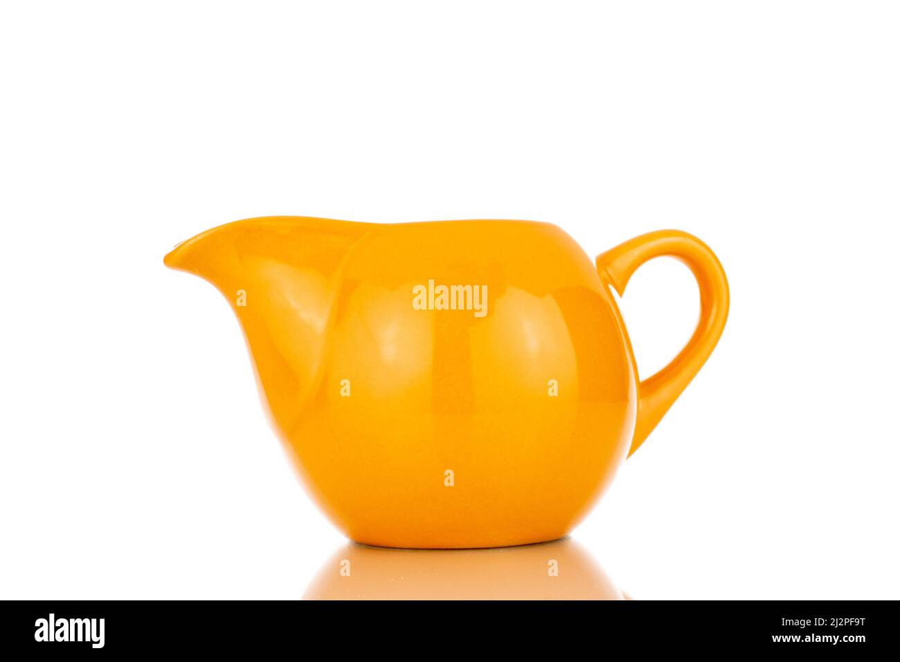 https://c8.alamy.com/comp/2J2PF9T/one-ceramic-milk-jug-close-up-isolated-on-a-white-background-2J2PF9T.jpg