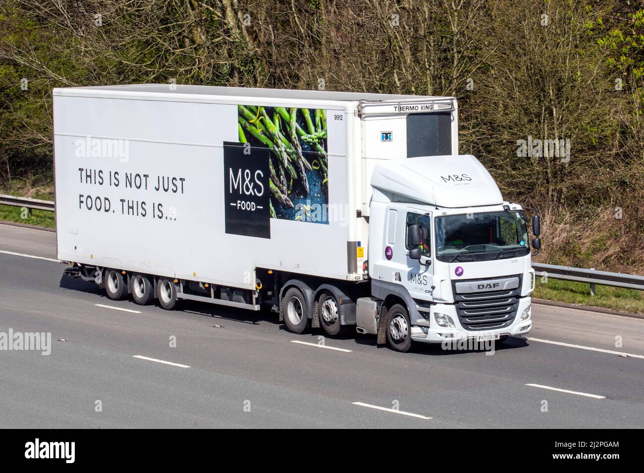 M&S, Marks and Spencer, Marks & Sparks, This is not just food, refrigerated articulated lorry on the M61 Manchester, UK Stock Photo