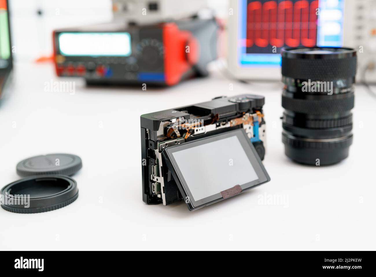 Repair of a mirrorless camera in a service center Stock Photo Alamy