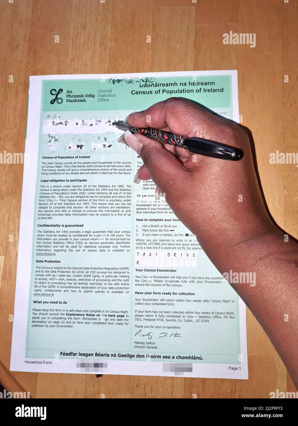 EDITORS NOTE IMAGE PIXELATED BY PA PICTURE DESK A person filling out an Irish census form as households across Ireland were set to complete their census forms on Sunday evening. Picture date: Sunday April 3, 2022. Stock Photo