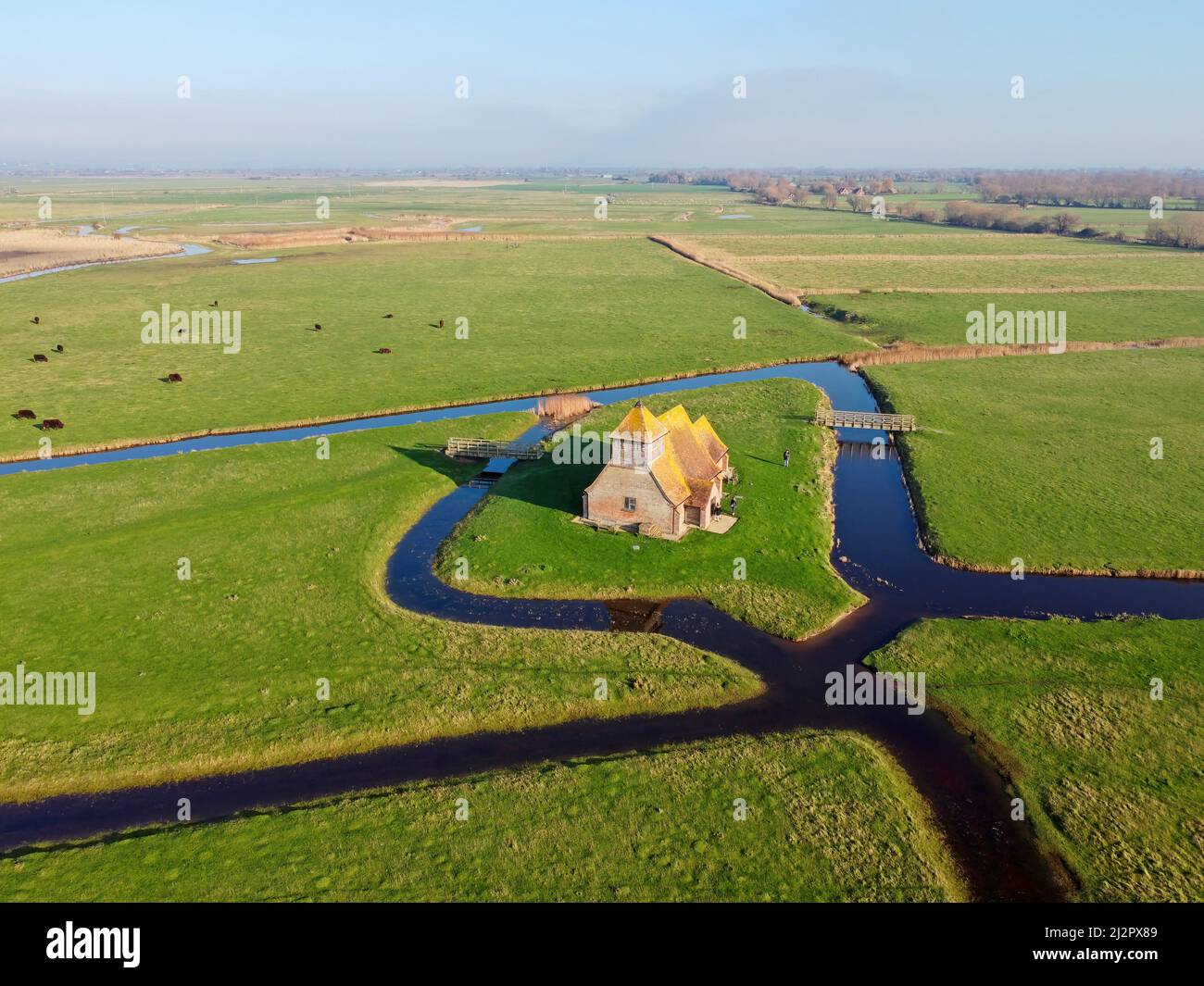 Aerial drone. St Thomas à Becket Church in Fairfield, Kent, on a sunny day. Stock Photo