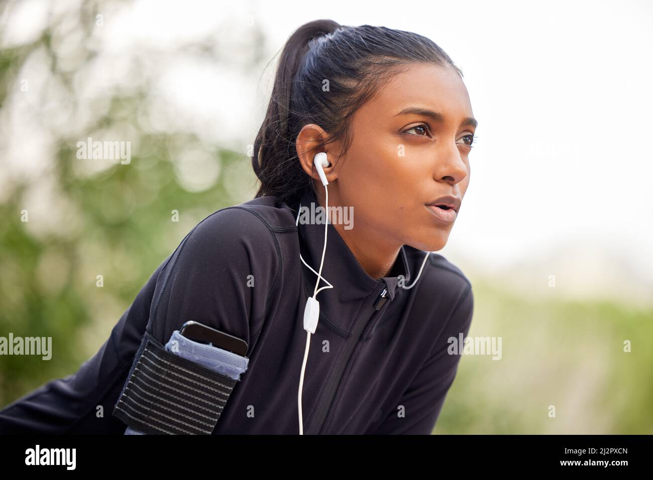 Breathe through what you go through. Shot of a fit young woman catching