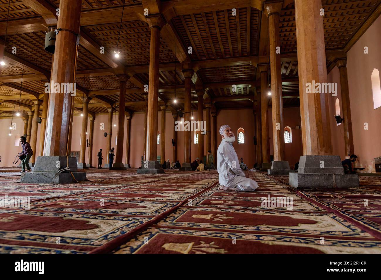 A Kashmiri muslim man look on as he pray inside Jamia Masjid on the ...